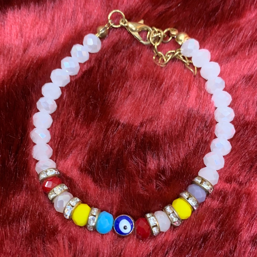 White eye bracelet with colorful stones